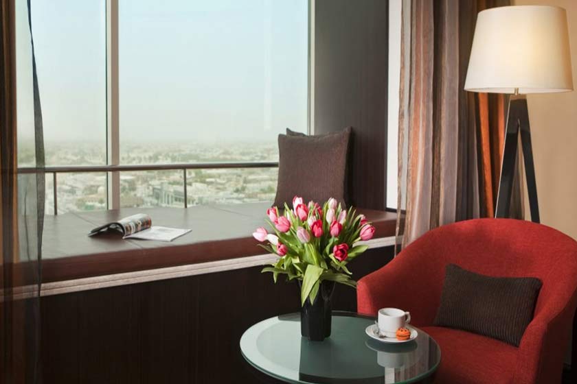 towers rotana hotel dubai - window seat view room king bed
