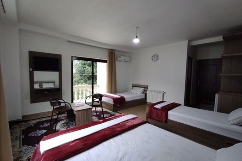 هتل آریانا ماسال - اتاق چهار تخته بدون بالکن رو به شالیزار و جنگل