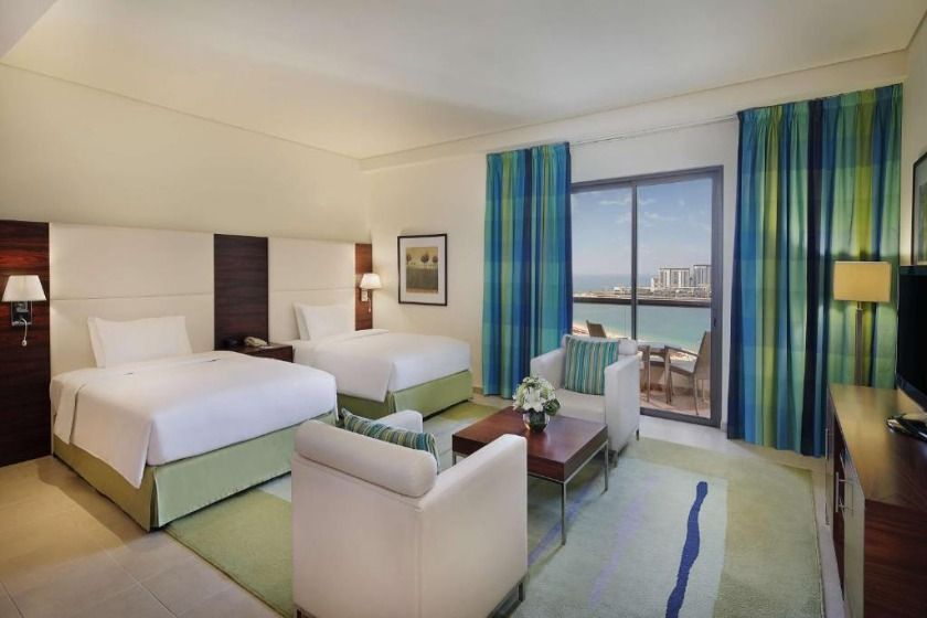 Hilton Dubai The Walk - Deluxe Twin Room with Sea View and Balcony