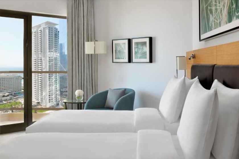 Executive Twin Partial Sea View with Balcony, Lounge Access, Breakfast, Refreshments & Evening drinks and Canapés 35 m² Balcony Sea view City view Bath Air conditioning Private bathroom Flat-screen TV Coffee machine Free WiFi Room size 35 m² 2 single beds Comfy beds, 8.9 – Based on 290 reviews The spacious triple room provides air conditioning, a tea and coffee maker, a balcony with sea views as well as a private bathroom featuring a bath. The unit offers 2 beds. In your private bathroom: Bath Free toiletries Shower Bathrobe Bidet Toilet Towels Slippers Hairdryer Additional toilet Towels/sheets (extra fee) Toilet paper View: Sea view City view Facilities: Balcony Air conditioning Safety deposit box Sofa Linen Socket near the bed Desk TV Telephone Coffee machine Tea/Coffee maker Iron Flat-screen TV Wake up service/Alarm clock Carpeted Electric kettle Outdoor furniture Wake-up service Alarm clock Executive lounge access Wardrobe or closet Smoking:  No smoking