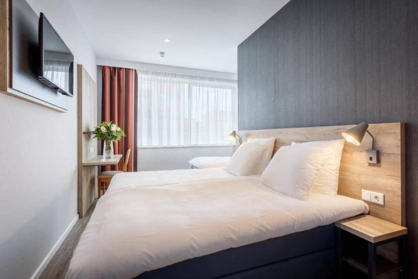 Joy Hotel - Deluxe Triple Room