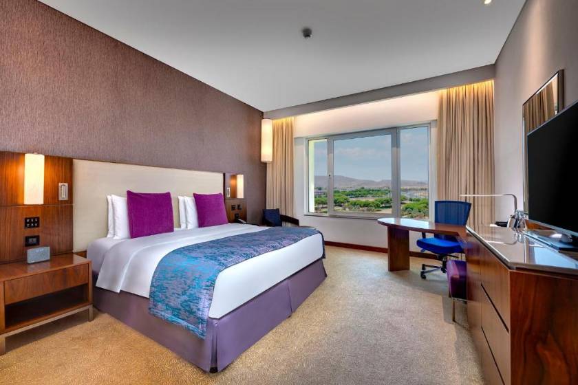 Crowne Plaza Muscat OCEC by IHG - Premium King Room with Garden View - Lounge Access