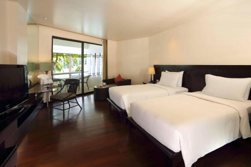 Le Meridien Phuket Beach Resort  Phuket - Deluxe Pool View, Guest room, 2 Twin/Single Bed(s), Balcony
